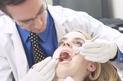 What's the difference between dental insurance and dental savings plans?