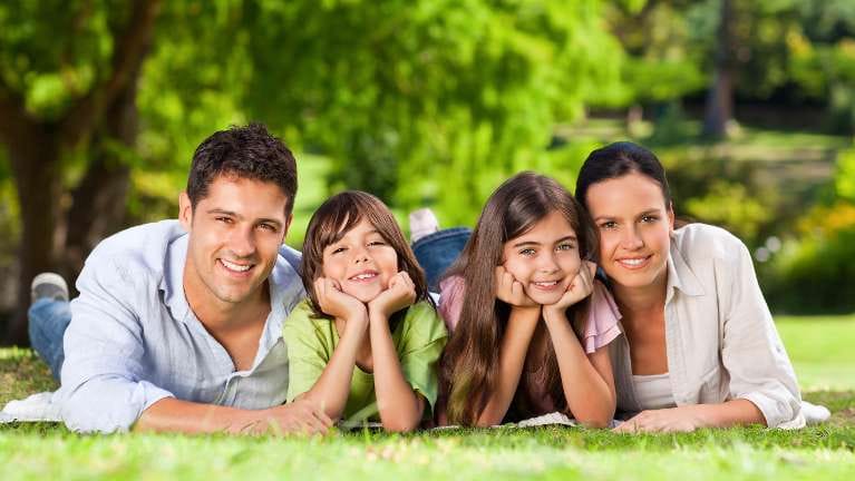 Family portrait on grass Family portrait on grass