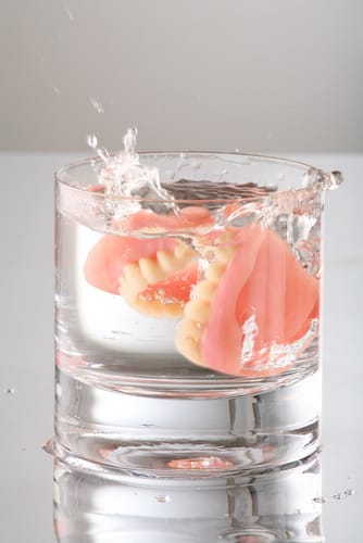 Daily dental care doesn't stop when people get dentures Daily dental care doesn't stop when people get dentures