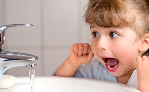 Teach Your Child to Floss Early for Better Dental Health Teach Your Child to Floss Early for Better Dental Health