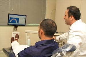 Dr Rayek with patient