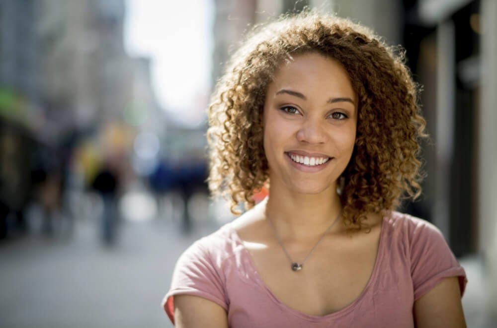 Pretty Young Lady Smiling - missing dental crown Pretty Young Lady Smiling - missing dental crown