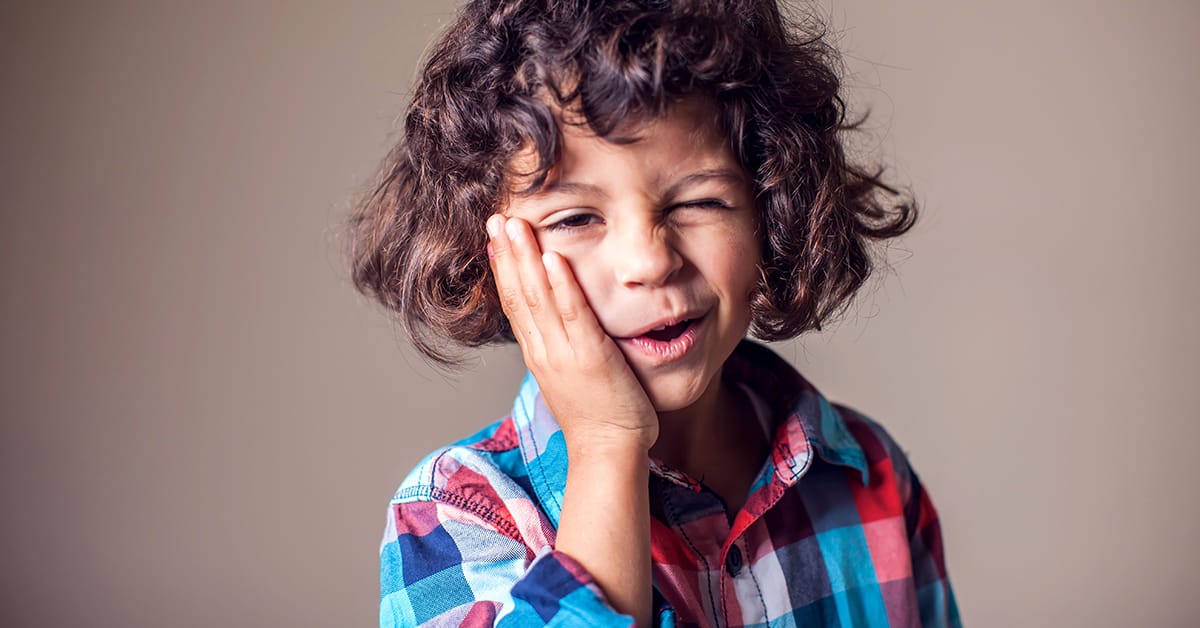 child with tooth pain child with tooth pain