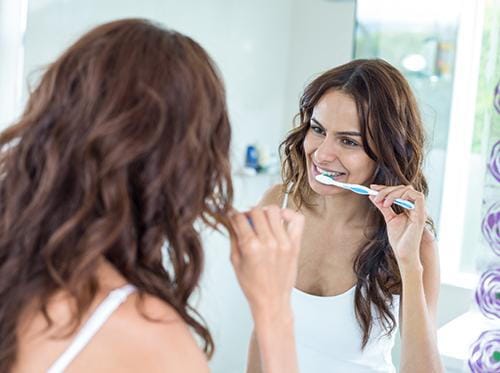 Woman Brushing Woman Brushing