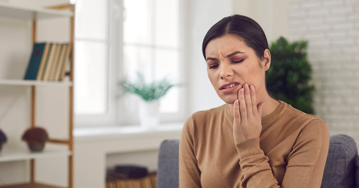 woman with tooth pain woman with tooth pain