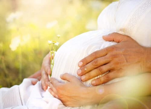 hands on pregnant belly