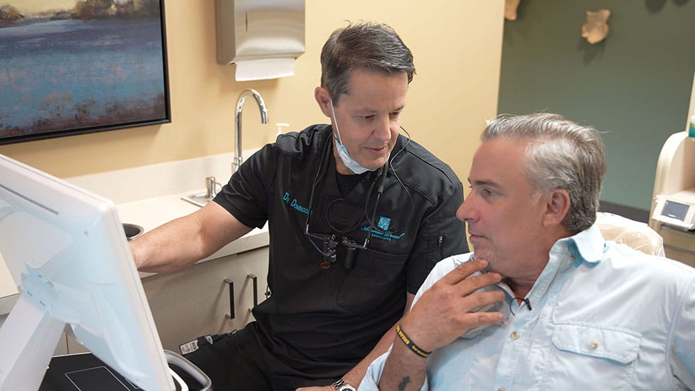 Dr Domingoes reviewing x-ray with patient