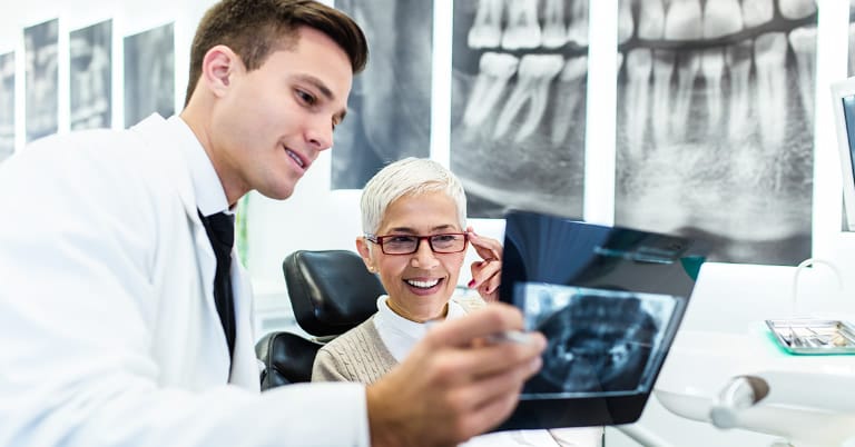 Woman planning new smile treatment Woman planning new smile treatment