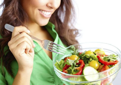 Woman Eating Salad