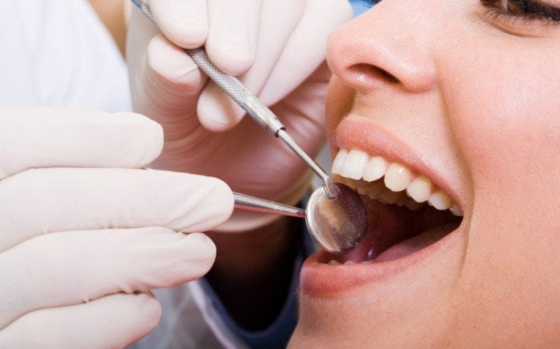 Dental Extraction and Root Canal Therapy