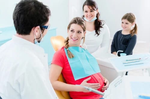 Pregnant mom at dentist Pregnant mom at dentist