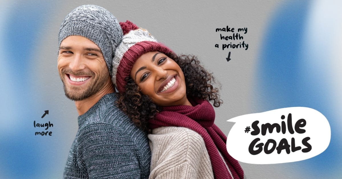 Happy men and women wearing winter hats Happy men and women wearing winter hats