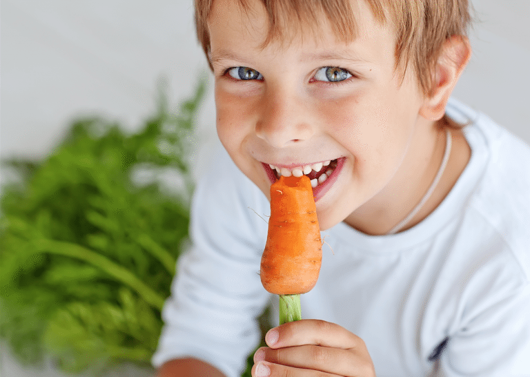 Child Eating Carrot