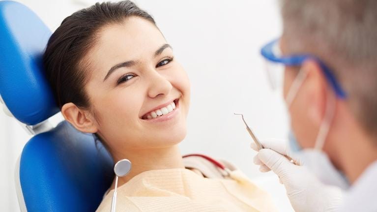 smiling at dentist smiling at dentist