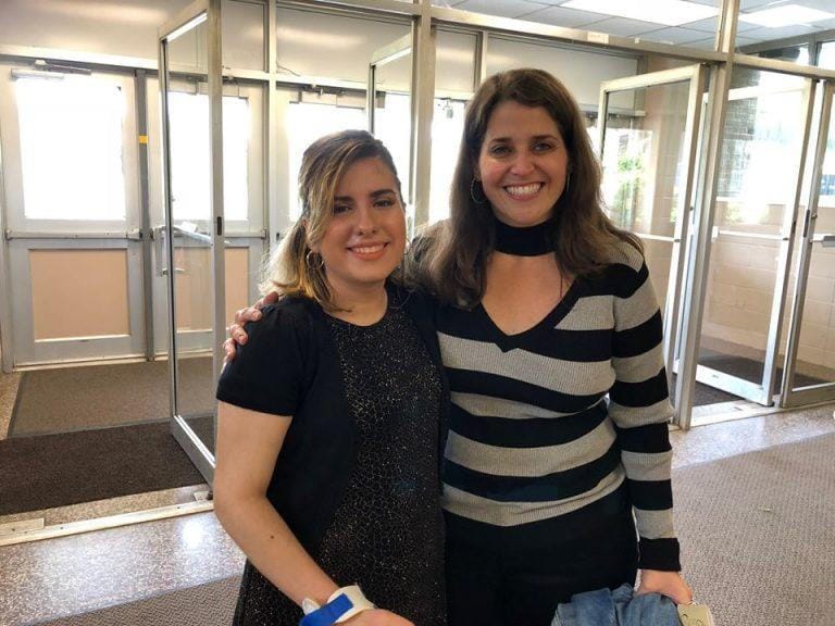 Dr. Bonnie Helfner and a graduating senior