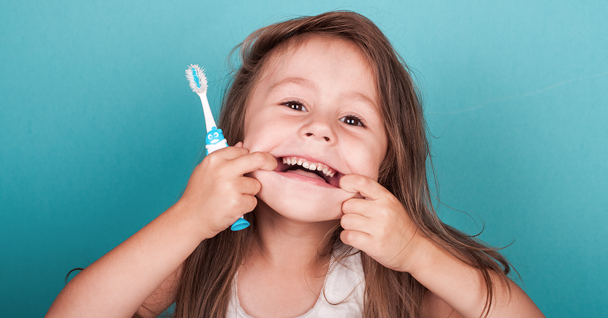 child caring for gums child caring for gums