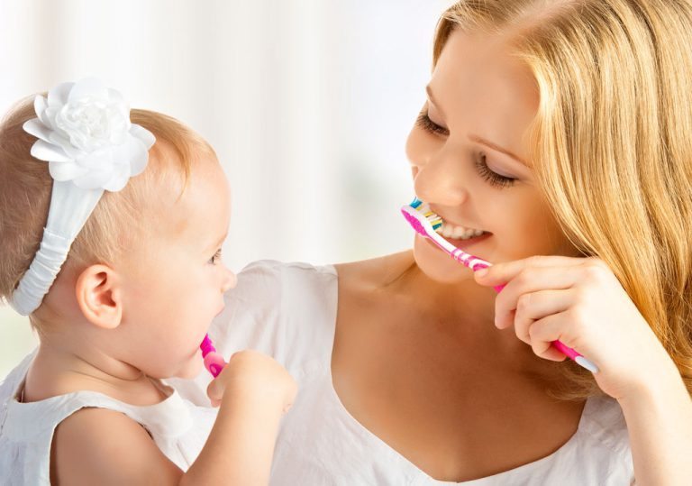 Brushing Mom & Daughter Brushing Mom & Daughter
