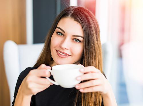 Woman with Coffee Cup Woman with Coffee Cup